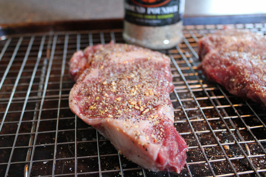 Ribeye Steak On Pan With Seasoning