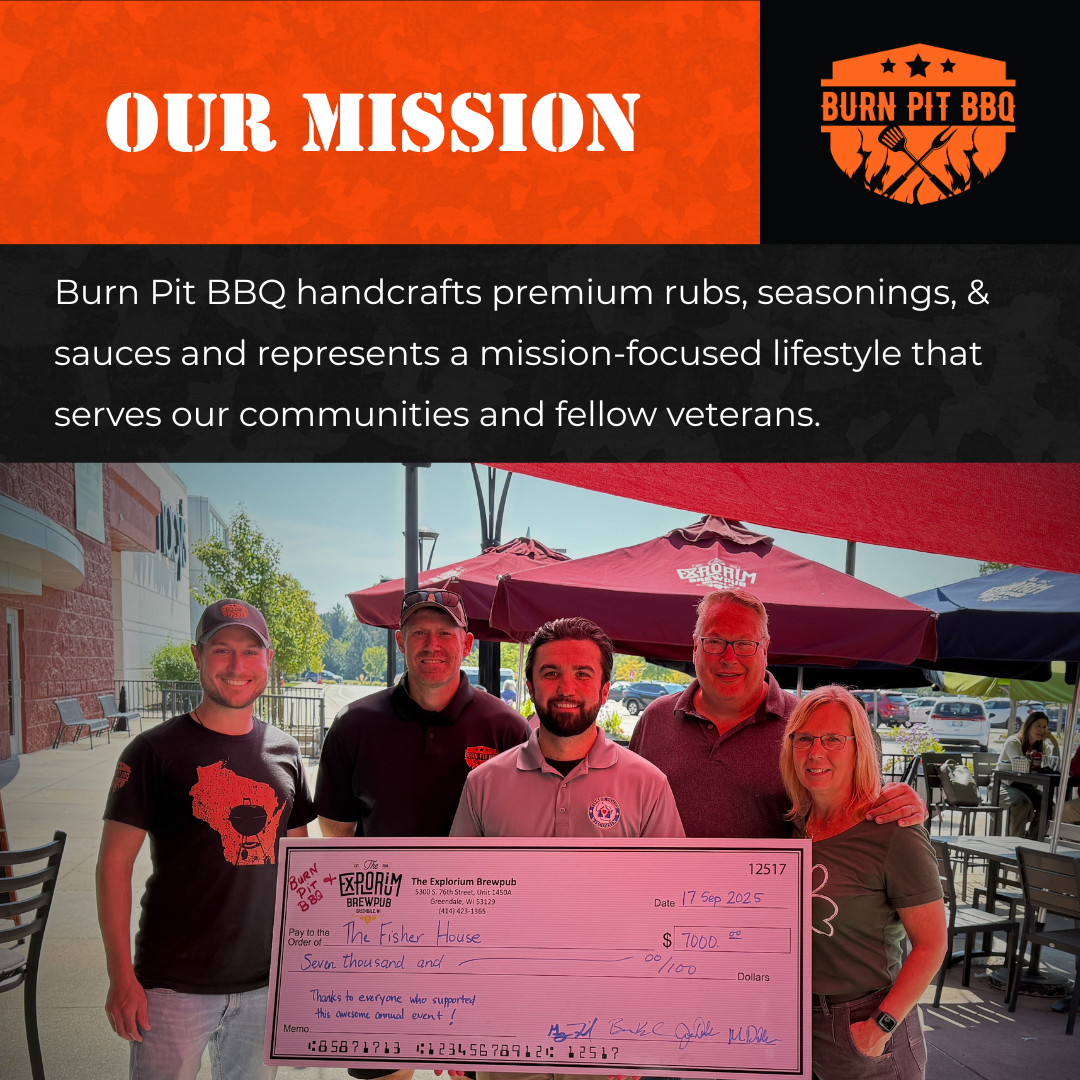 Group of people holding a check with Burn Pit BBQ logo and mission statement.